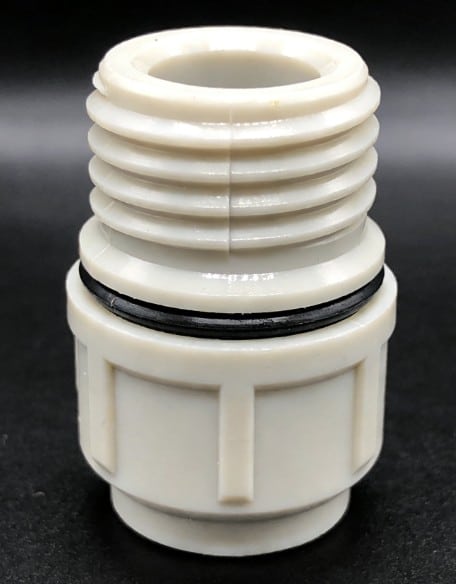 Toughened PA1010 hydraulic pipe fitting for vibration damping and high pressure